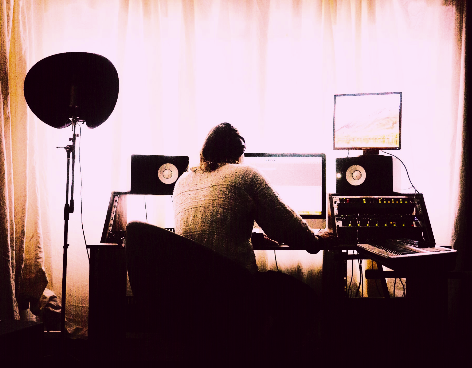 Alfred in his studio making music